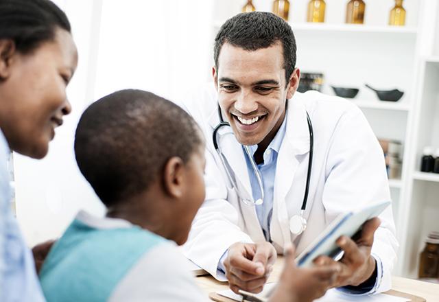 mother and son with pediatrician