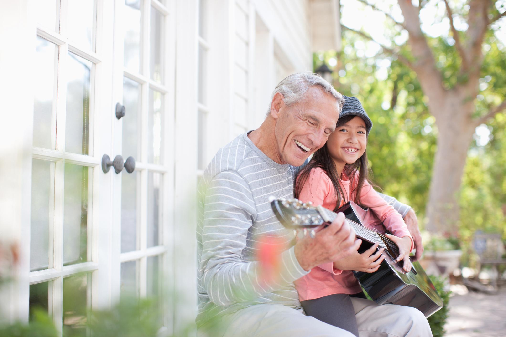 grandfather and child singing